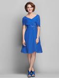 A-Line Mother of the Bride Dress Elegant V Neck Knee Length Chiffon Short Sleeve with Criss Cross Beading Ruffles